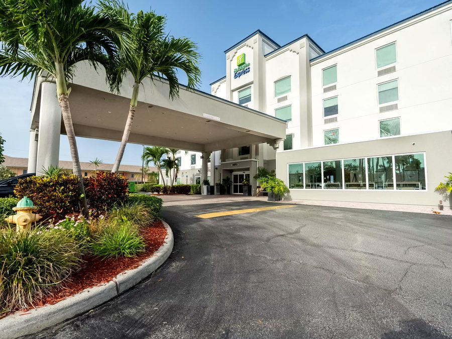 Holiday Inn Express & Suites Cocoa exterior at sunset